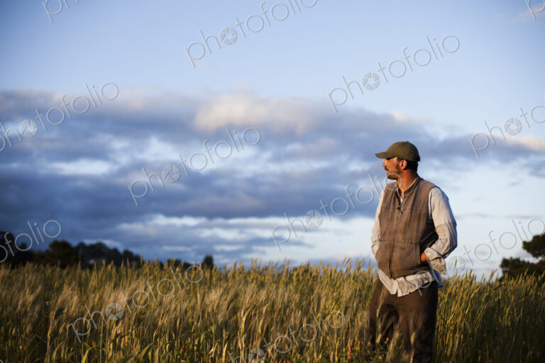 A man standing looking over the crops and fields at the Homeless Garden Project in…