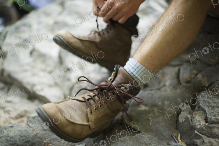A man taking his boots off