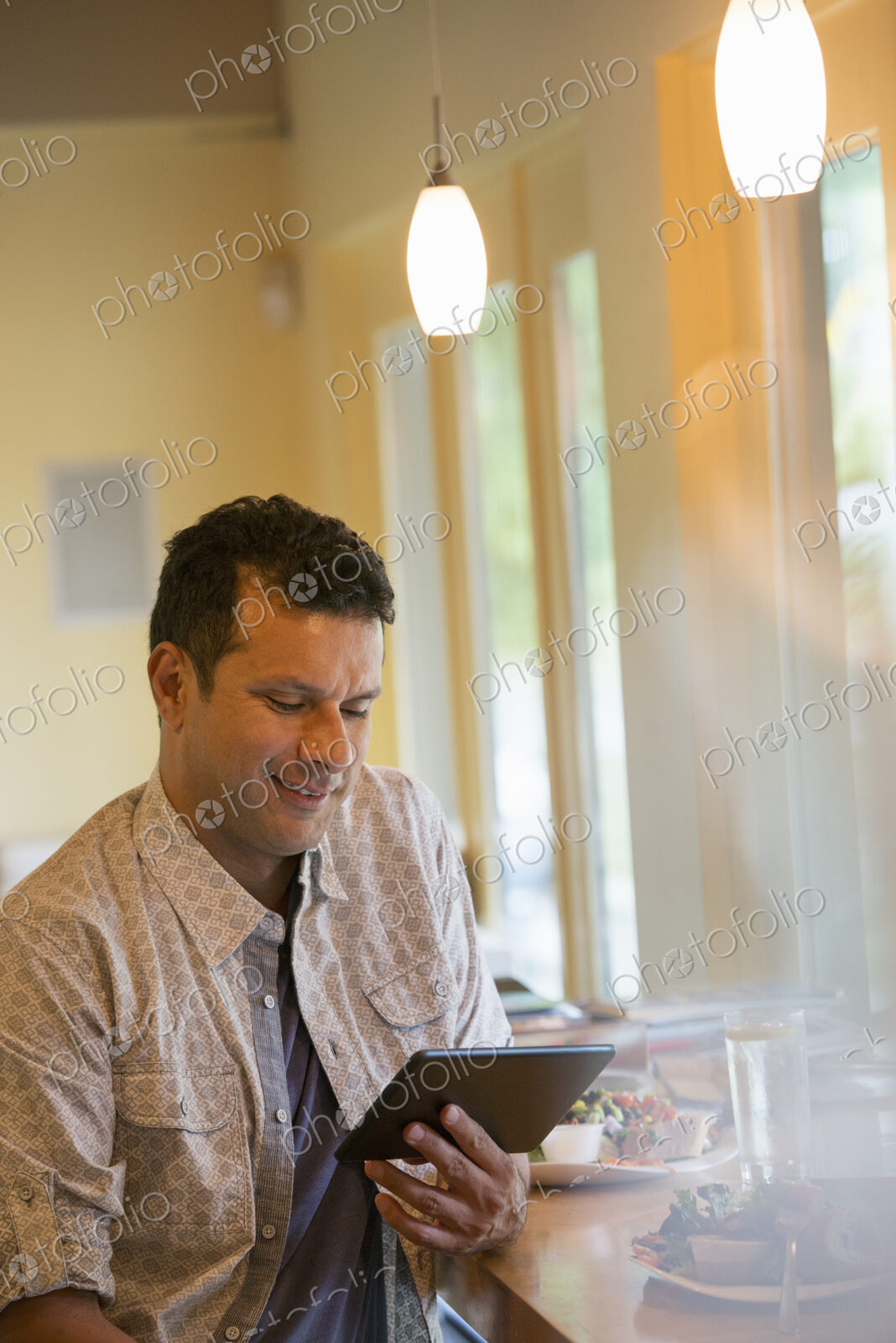 A man using a digital tablet.