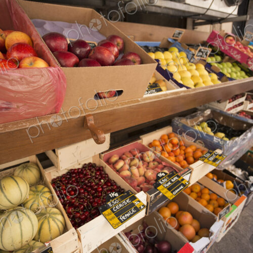 A market stall with displays of fresh fruit in Bonifacio on Corsica.