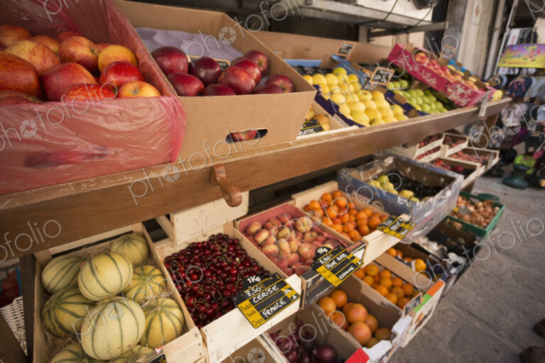 A market stall with displays of fresh fruit in Bonifacio on Corsica.