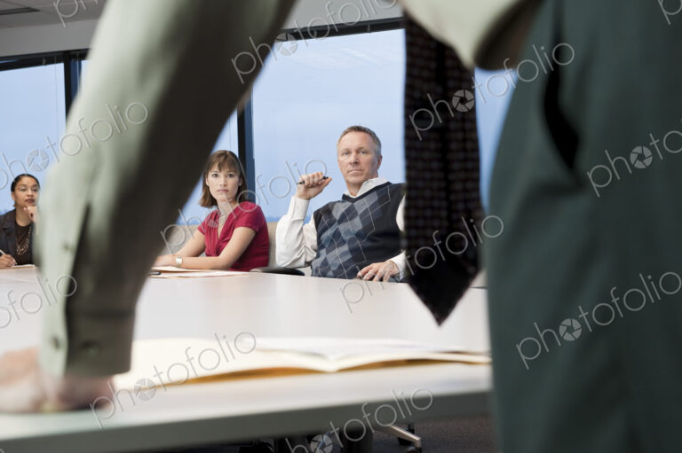 A meeting in progress in a conference room.
