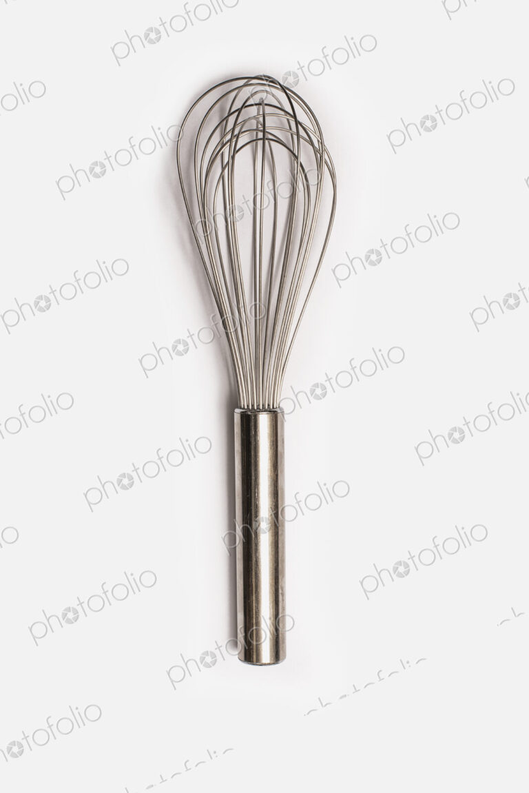 A metal balloon cooking whisk with metal handle.