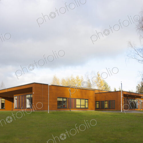 A modern pre-school or day care nursery, open space and grass. A modern pre-school or day care nursery, open space and grass.