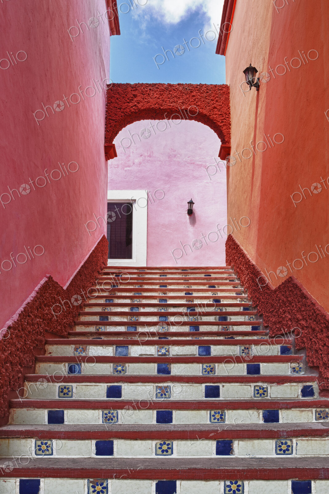 A painted stairway,steps and risers.