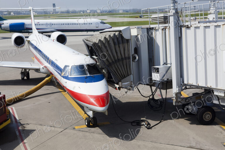 A passenger aircraft and connected passenger boarding tunnel or airbridge