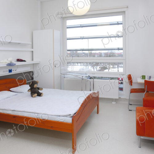 A patient room in a modern hospital. A patient room in a modern hospital.