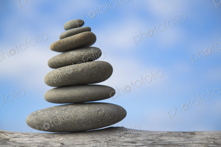 A pile of balancing smooth beach rocks near Rialto Beach, Olmpic national park, in…