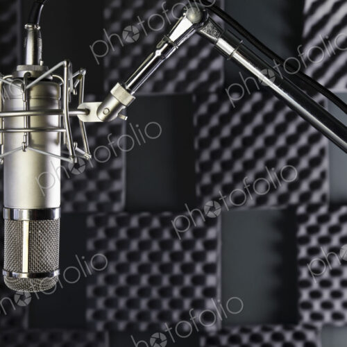 A professional microphone in a home recording studio with sound proof walls A professional microphone in a home recording studio with sound proof walls