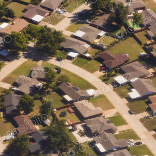 A residential area, an aerial view of the houses, layout and gardens and the roads. A residential area, an aerial view of the houses, layout and gardens and the roads.