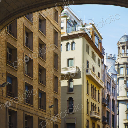 A row of business and apartment buildings on the edge of the Gothic Quarter in…