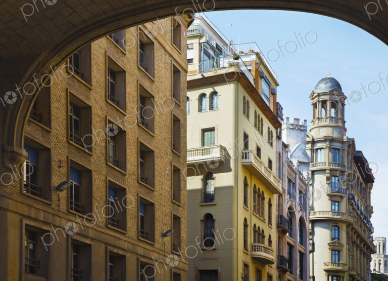 A row of business and apartment buildings on the edge of the Gothic Quarter in…