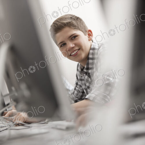 A school room, computer laboratory or lab with rows of computer monitors and seating.… A school room, computer laboratory or lab with rows of computer monitors and seating.…