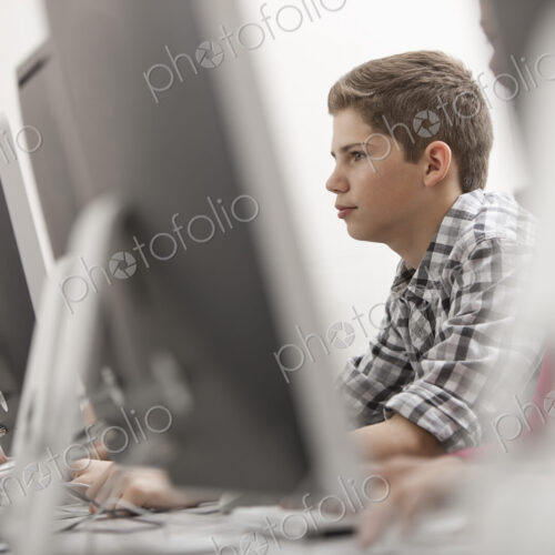 A school room, computer laboratory or lab with rows of computer monitors and seating.… A school room, computer laboratory or lab with rows of computer monitors and seating.…
