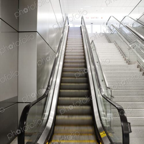 A set of moving steps, escalators.
