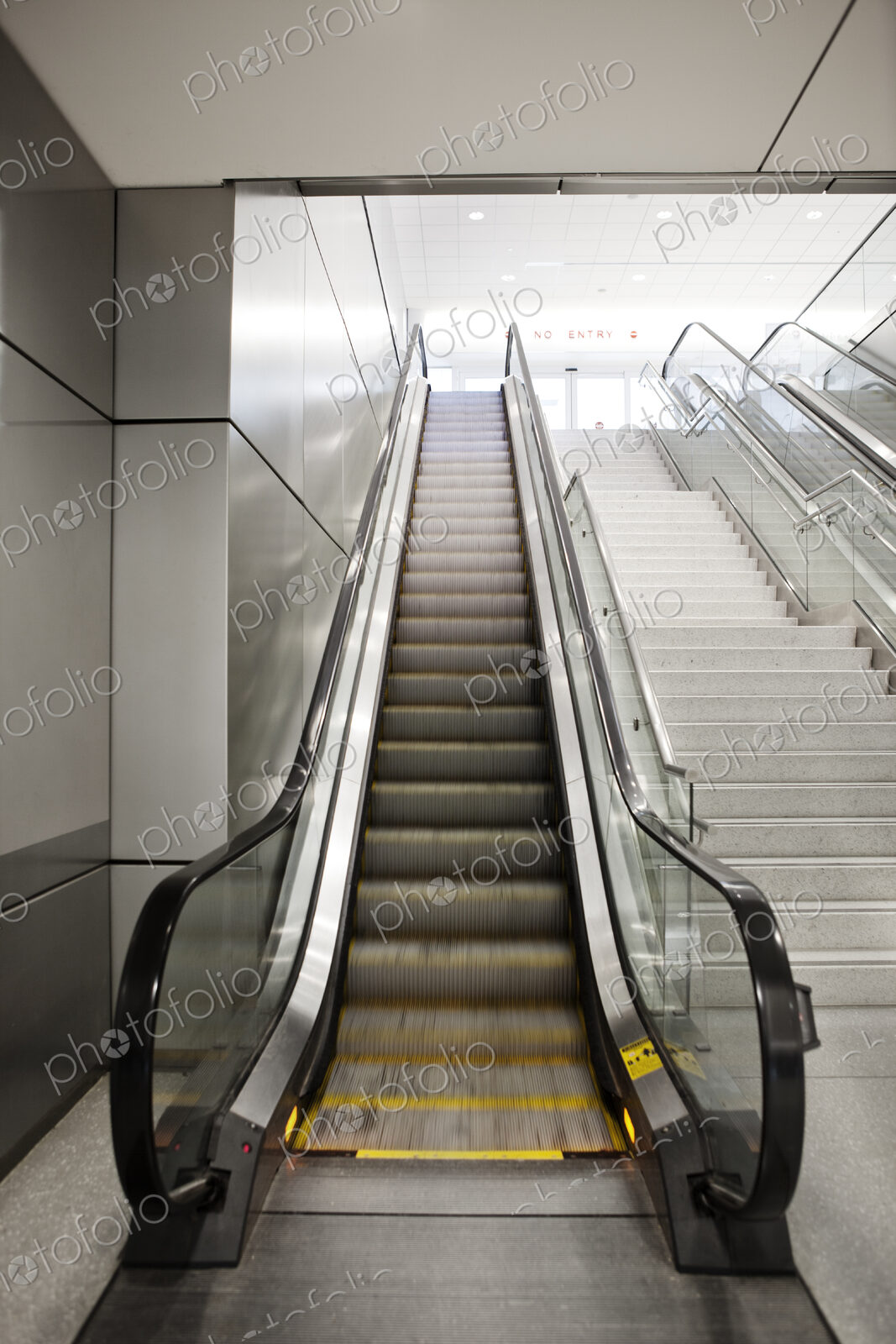 A set of moving steps, escalators.