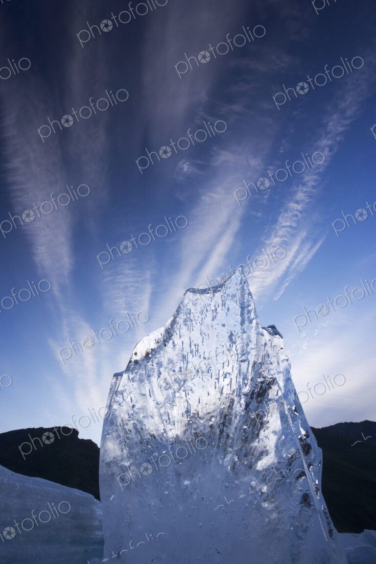 A shard of aufeis reaches toward the arctic sky.