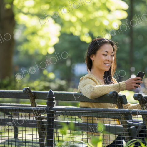 A small group of people, a businesswoman and two businessmen outdoors in the city. A small group of people, a businesswoman and two businessmen outdoors in the city.