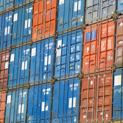 A stack of cargo containers, commercial freight containers, packed together and… A stack of cargo containers, commercial freight containers, packed together and…