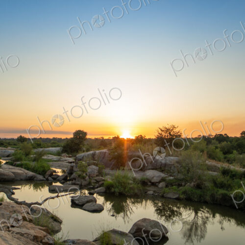 A sunset over a riverine landscape. A sunset over a riverine landscape.