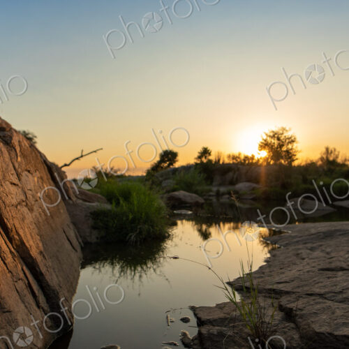 A sunset over a riverine landscape. A sunset over a riverine landscape.