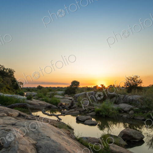 A sunset over a riverine landscape. A sunset over a riverine landscape.