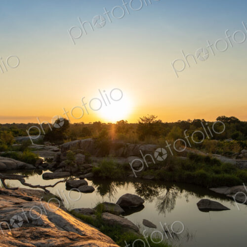 A sunset over a riverine landscape. A sunset over a riverine landscape.