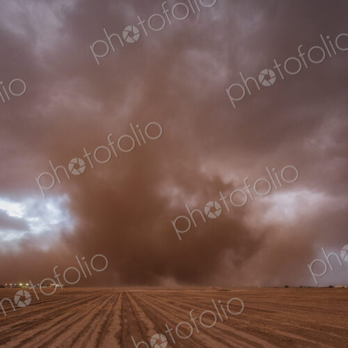 A supercell, a severe warning weather event, clouds reaching to the ground on the…