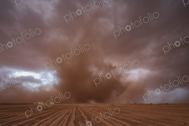 A supercell, a severe warning weather event, clouds reaching to the ground on the…