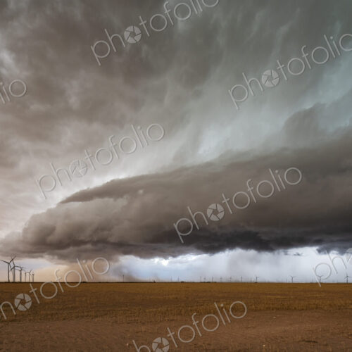 A supercell event, a severe warning storm, a layer of clouds just above the horizon.