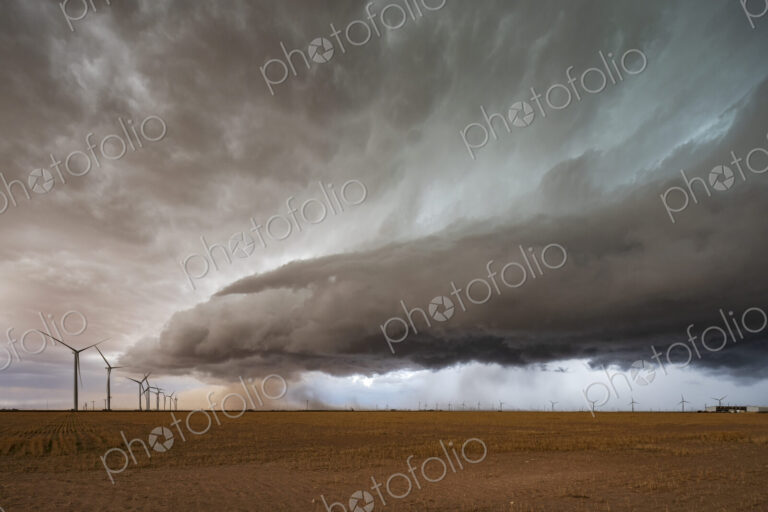 A supercell event, a severe warning storm, a layer of clouds just above the horizon.