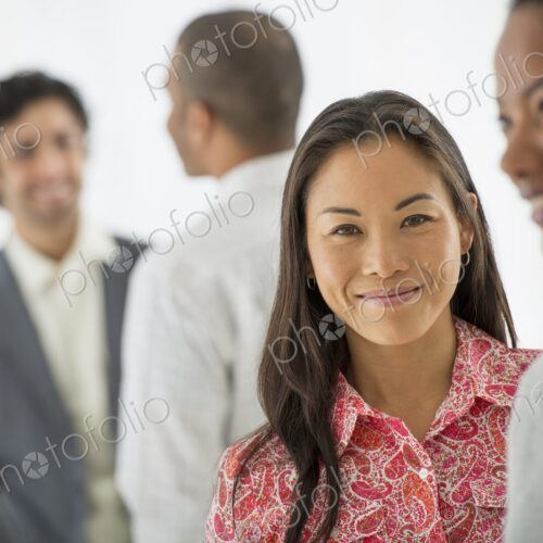 A team of people, multi ethnic group, men and women in a group.