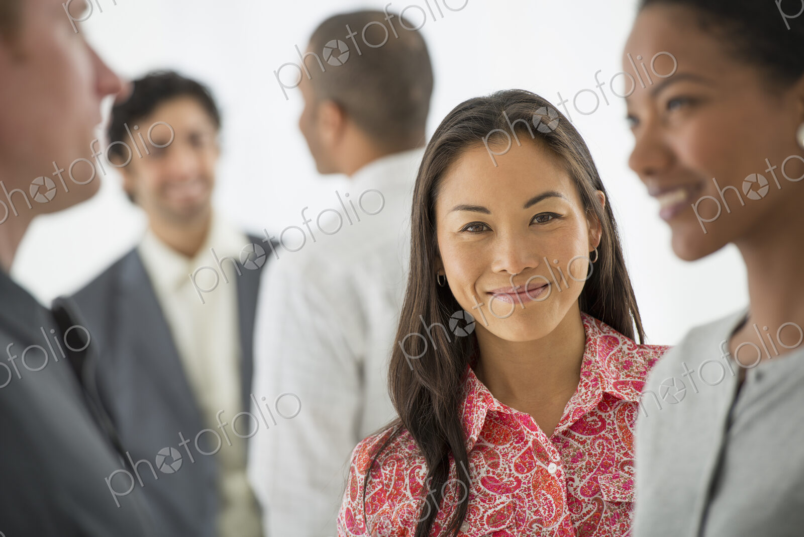 A team of people, multi ethnic group, men and women in a group.