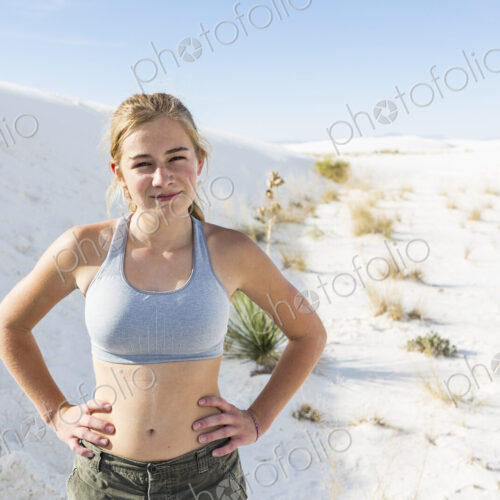 A teenage girl in the open landscape of White Sands Nat'l Monument, NM A teenage girl in the open landscape of White Sands Nat'l Monument, NM