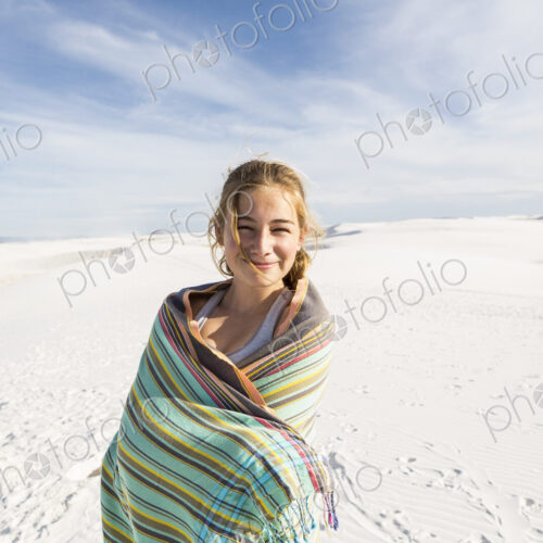 A teenage girl in the open landscape of White Sands Nat'l Monument, NM A teenage girl in the open landscape of White Sands Nat'l Monument, NM