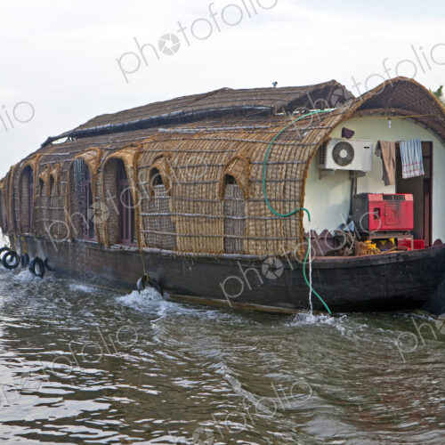 A traditional houseboat on the waterways of the coastline of Kerala