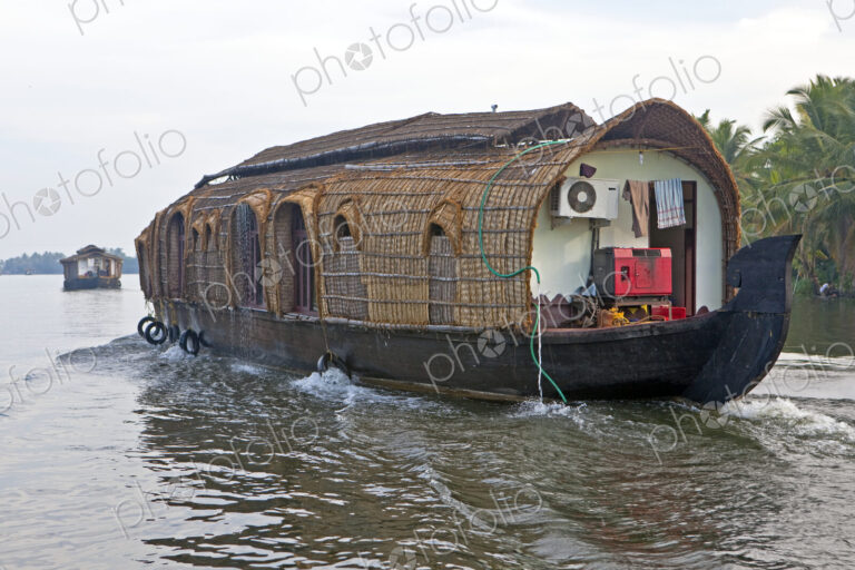 A traditional houseboat on the waterways of the coastline of Kerala