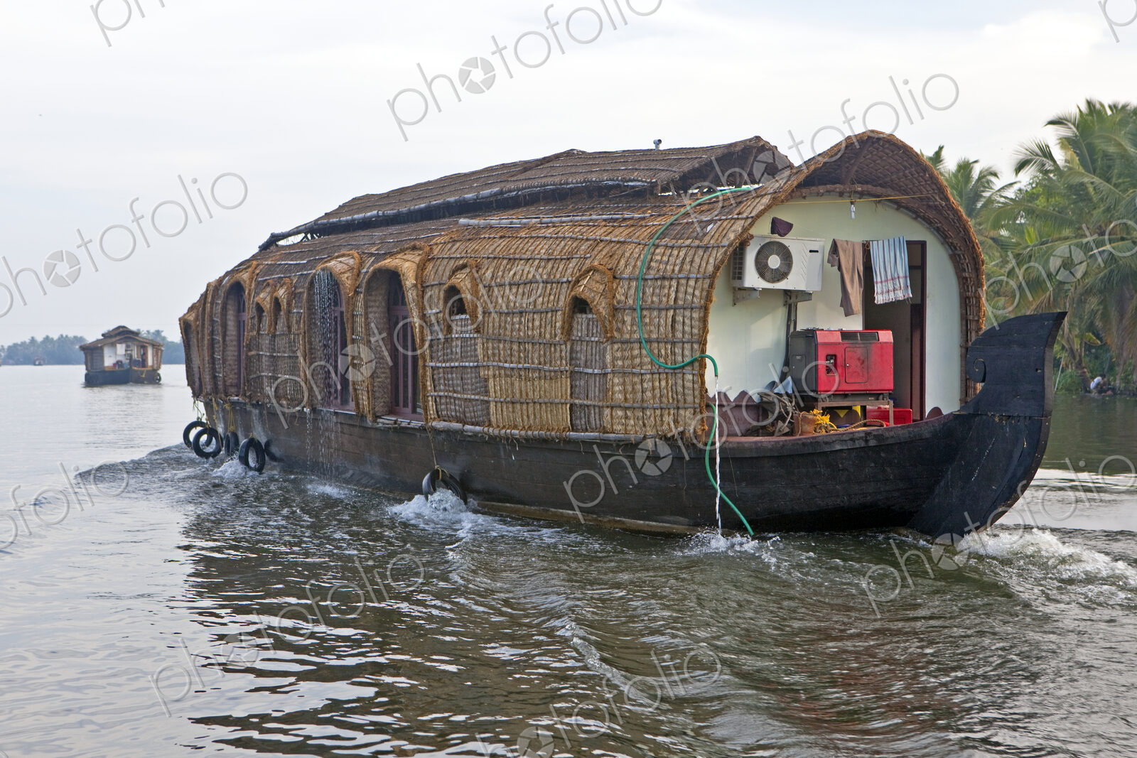 A traditional houseboat on the waterways of the coastline of Kerala