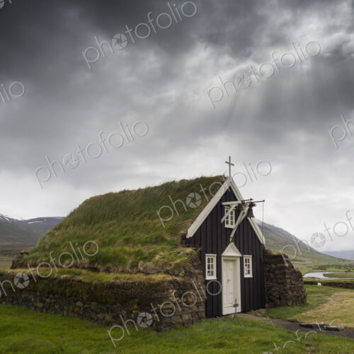 A traditional wooden church with turf roof, earth and grass material on the steep… A traditional wooden church with turf roof, earth and grass material on the steep…