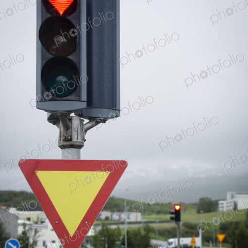 A traffic signal on the roadside, a heart shaped red light. A traffic signal on the roadside, a heart shaped red light.