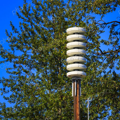 A tsunami alarm installation on Lummi Island among the trees. A tsunami alarm installation on Lummi Island among the trees.