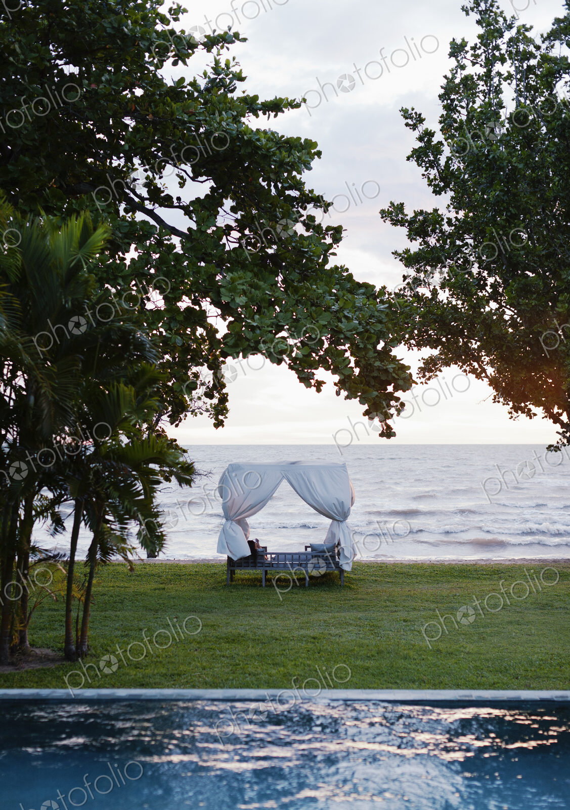 A view of the infinity pool and Gulf of Thailand at Knai Bang Chatt Hotel.