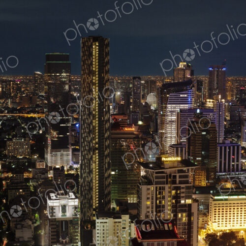 A view over the city of Bangkok, Thailand at night. A view over the city of Bangkok, Thailand at night.