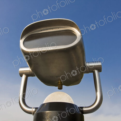 A viewfinder at a viewing point, blue sky background. A viewfinder at a viewing point, blue sky background.