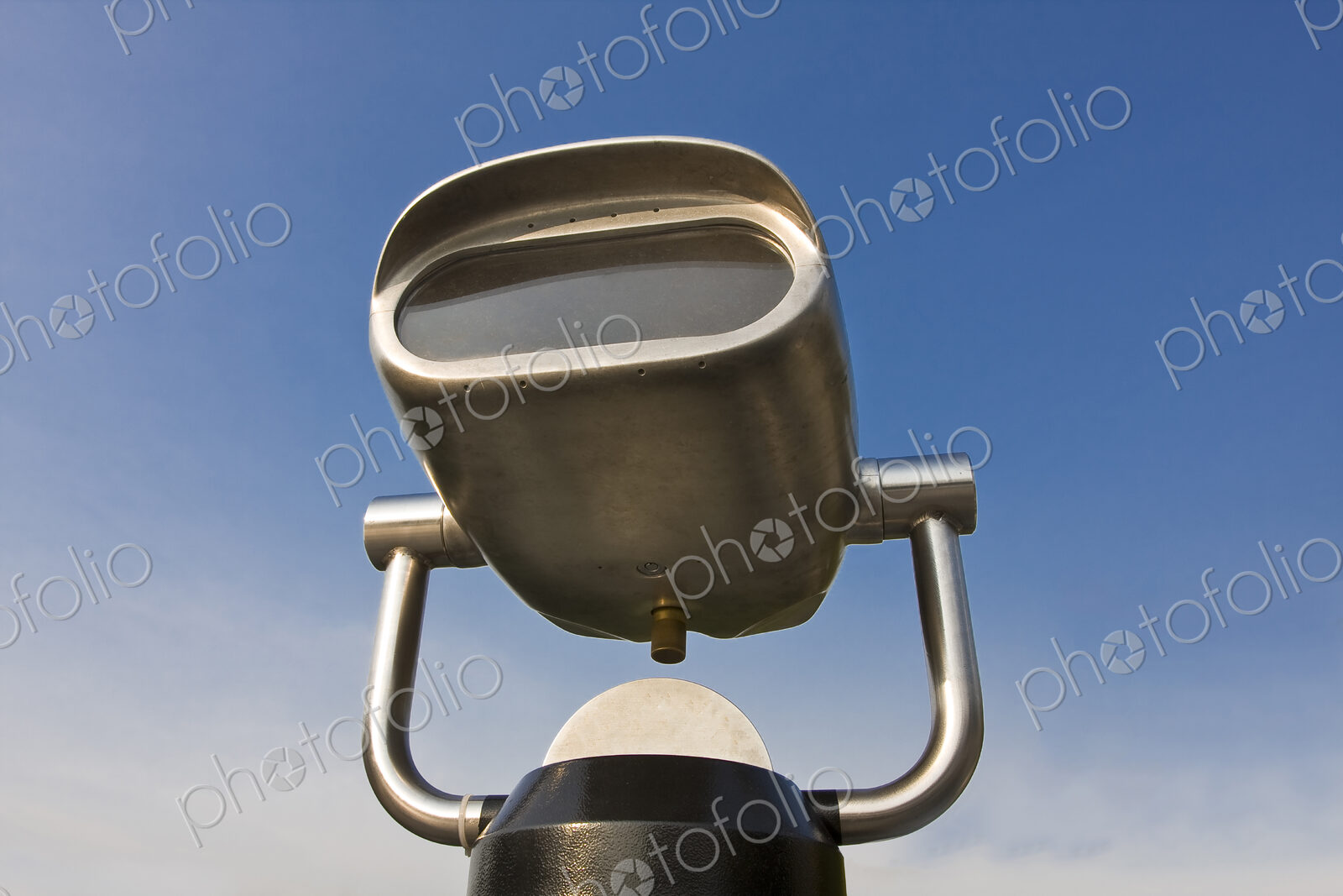 A viewfinder at a viewing point, blue sky background.