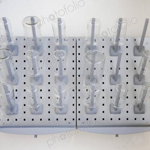 A wall rack of jars and flasks in the Chemistry laboratory at a university chemistry… A wall rack of jars and flasks in the Chemistry laboratory at a university chemistry…