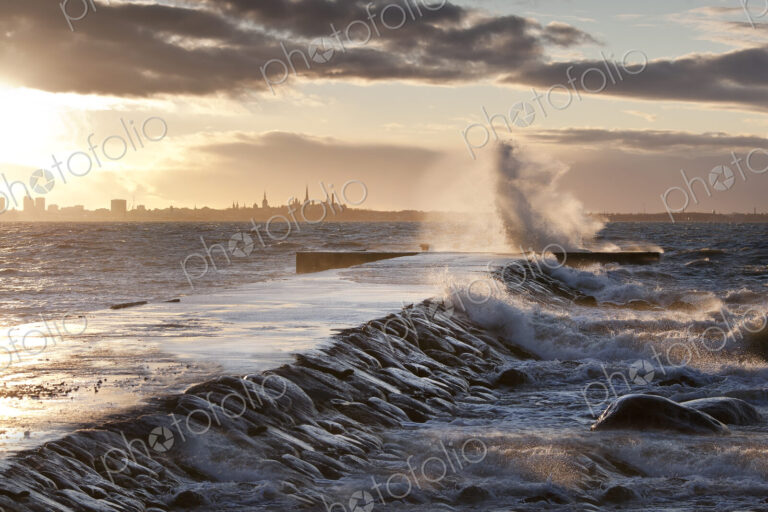 A weather storm in the Baltic Sea, waves crashing over a pier