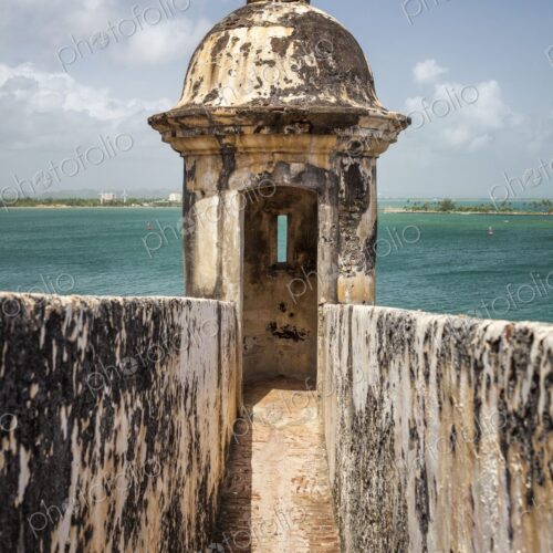 A weathered sentry box sits at the edge of Castillo San Felipe del Morro in San Juan,… A weathered sentry box sits at the edge of Castillo San Felipe del Morro in San Juan,…