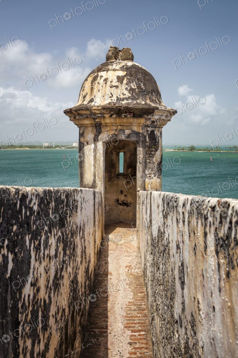 A weathered sentry box sits at the edge of Castillo San Felipe del Morro in San Juan,…