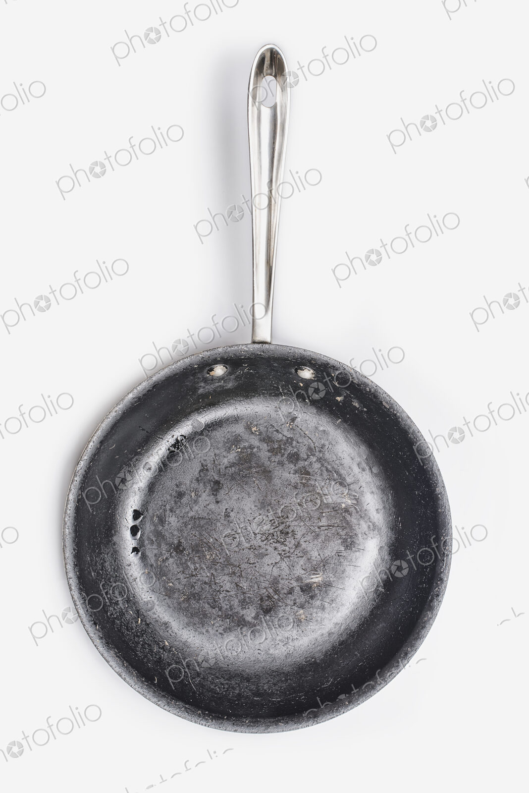 A well seasoned frying pan, with a smooth cooking surface.